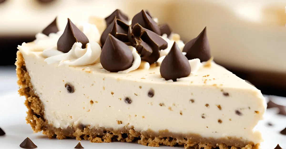 A delicious no-bake banana cheesecake topped with whipped cream and chocolate chips