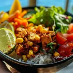 delicious vegetarian lunch bowl held by hand with a resort island background.